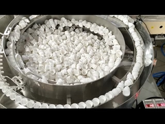 Máquina de triagem de tampas